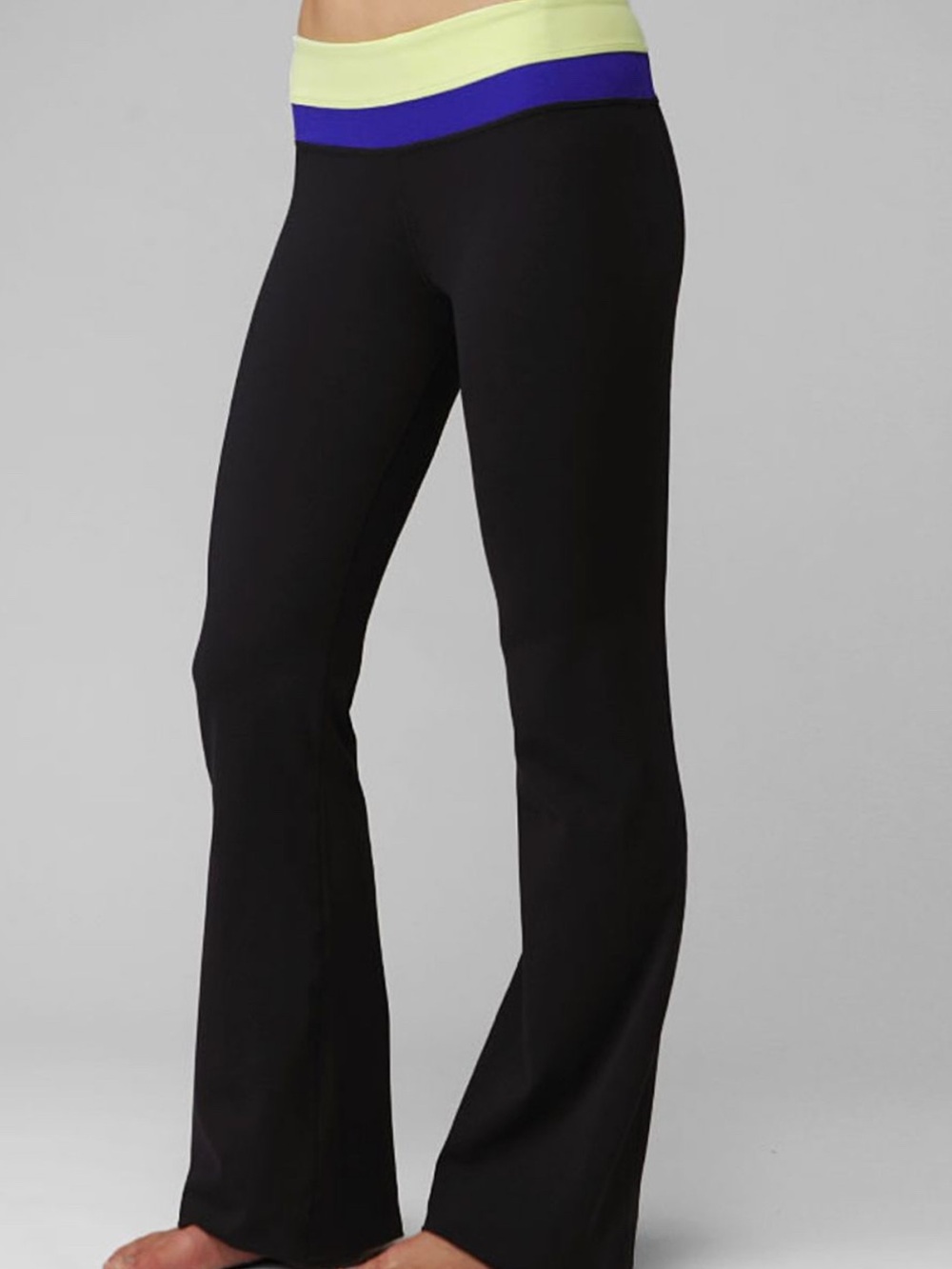Lululemon Groove Pant with teal and green band flare leggings